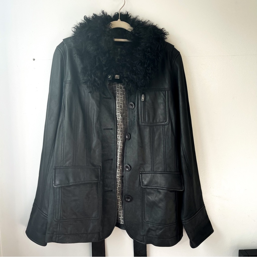 Black leather jacket by UGG - shearling collar, soft leather exterior.